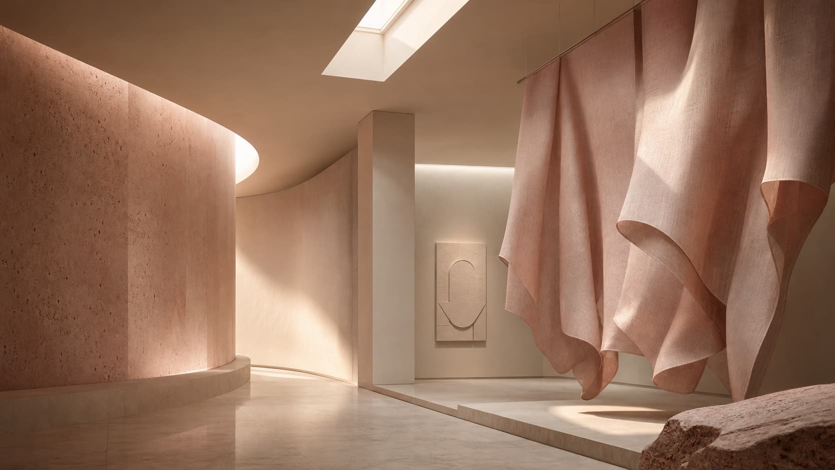 A blush-stone gallery softened by suspended folds of linen